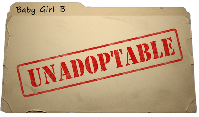A manila folder stamped UNADOPTABLE in red letters